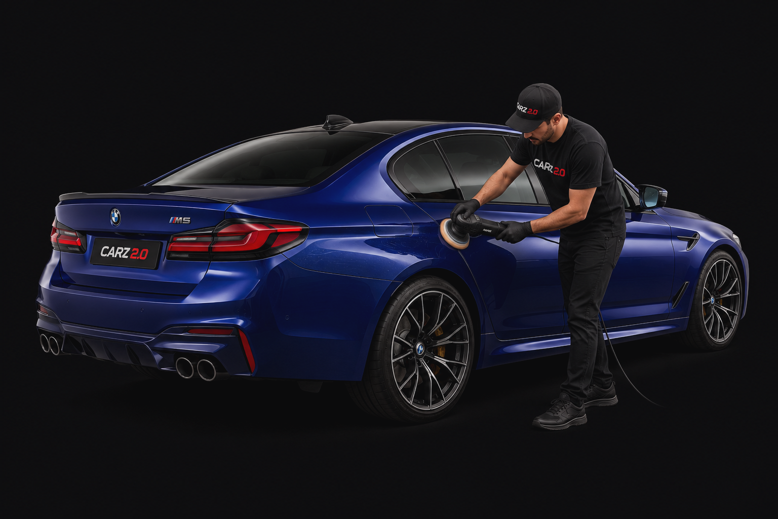 Detailing specialist polishing a premium blue sedan