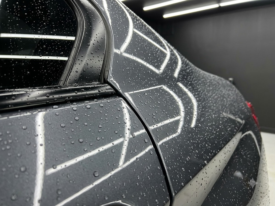 Coated panel showing water beading tightly on the surface