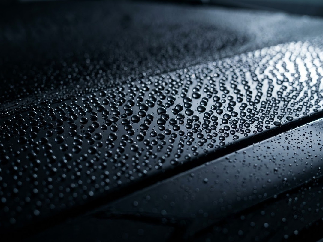 Dark paint finish under workshop inspection lighting