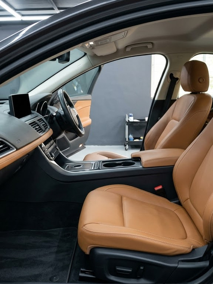 The same tan leather cabin cleaned and conditioned